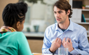 black female and white male talking | Hero image for Emotional Intelligence & How to Improve it